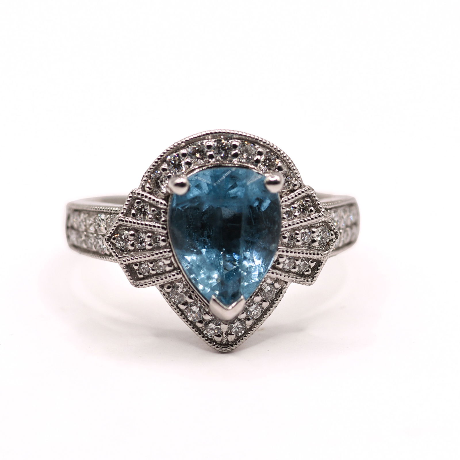 PLATINUM AQUAMARINE AND DIAMOND RING: Pear, modified brilliant cut, greenish-blue natural beryl aquamarine centerstone, 2.27 CT. Round brilliant cut diamond accent stones, 0.42 CT, 42 pieces. Gross total weight 8.2 Gram. Size 6.75.
