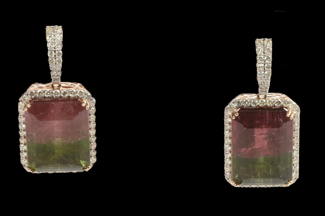 14K YELLOW GOLD NATURAL BI-COLORED TOURMALINE AND DIAMOND EARRINGS: Emerald, faceted cut natural bi-colored tourmaline center stones, pink and green, 64.55CT, 2 pieces. Round brilliant cut accent diamonds, 2.61CT, 108 pieces. Gross total weight 22.4 Grams. Length of e