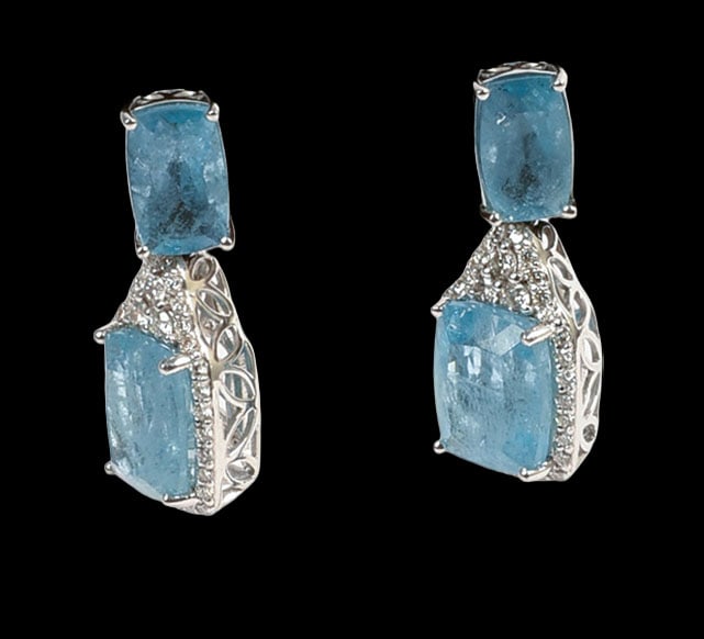 PLATINUM NATURAL AQUAMARINE BERYL AND DIAMOND EARRINGS: Rectangular cushion cut, faceted, greenish blue, aquamarine beryl gemstones, 10.13 CT, 4 pieces. Round brilliant cut diamond accent stones, 0.70 CT, 68 pieces. Gross total weight 10.3 Grams. Length on