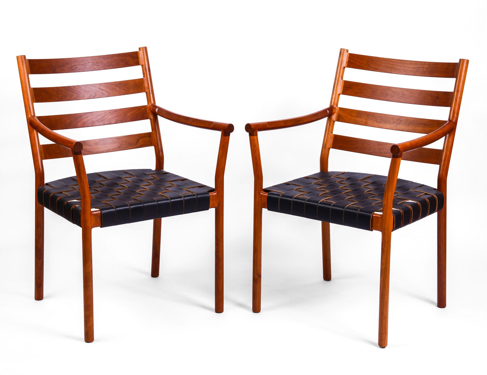 Pair of Thomas Moser Cherry Armchairs.: Seat height 17 inches, overall height 25 inches, width 20 inches, depth 17 inches. Very good condition.