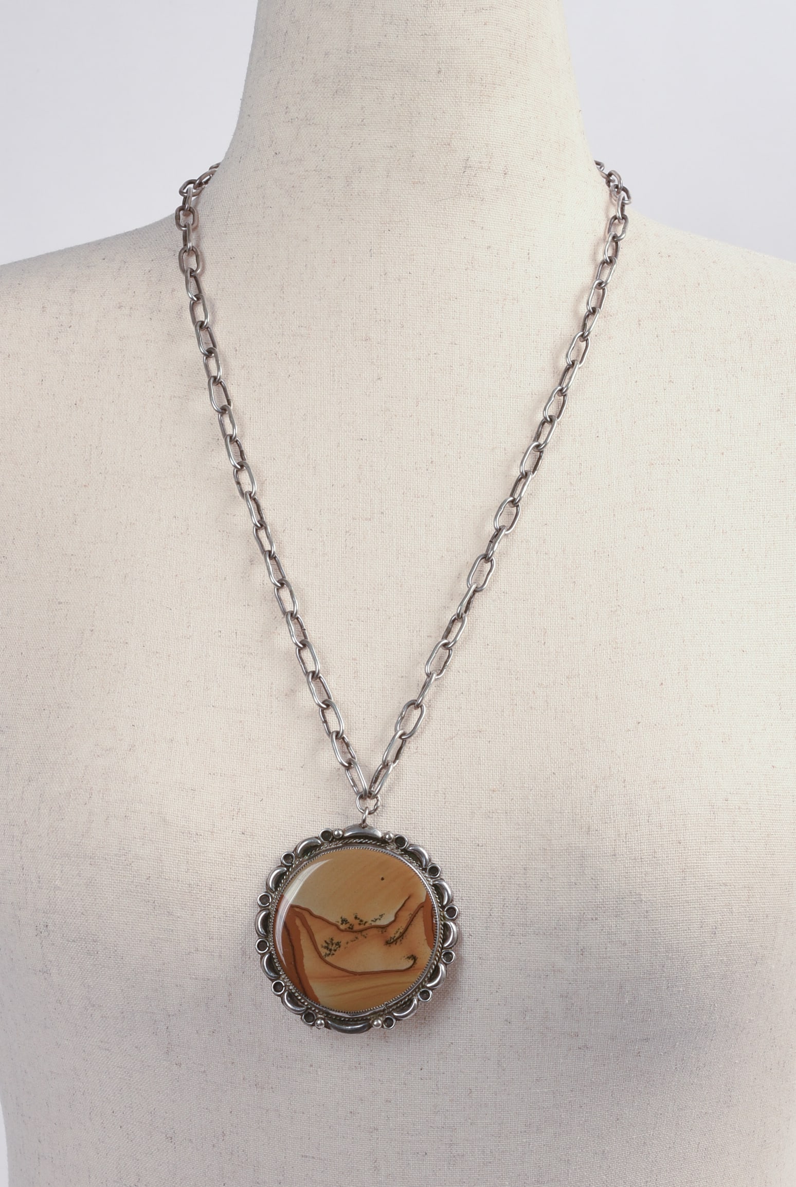 Navajo Sterling Necklace With Large Jasper Pendant: Length of necklace 24 inches, diameter of pendant 2.25 inches, 2.5 ozt.