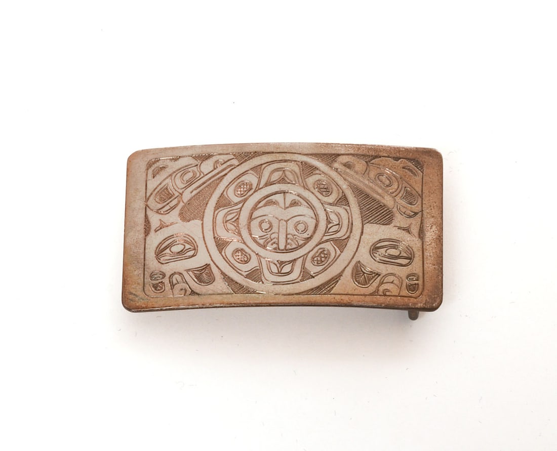 Phil Whonnock Native American Sterling Belt Buckle.: 1.375 x 2.5 inches, signed and titled 'Sun + Ravens'