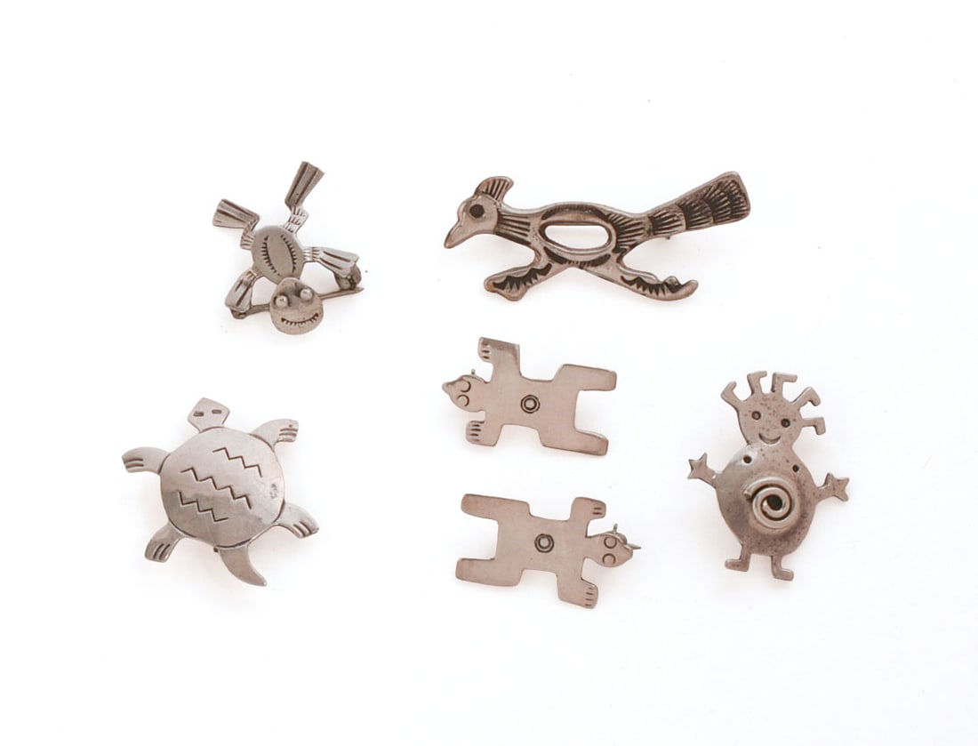 Six Small Native American Sterling Pins.: Turtle, 1.125 x 1 inch, road runner, 3 frog pins, and a child. 0.492 ozt