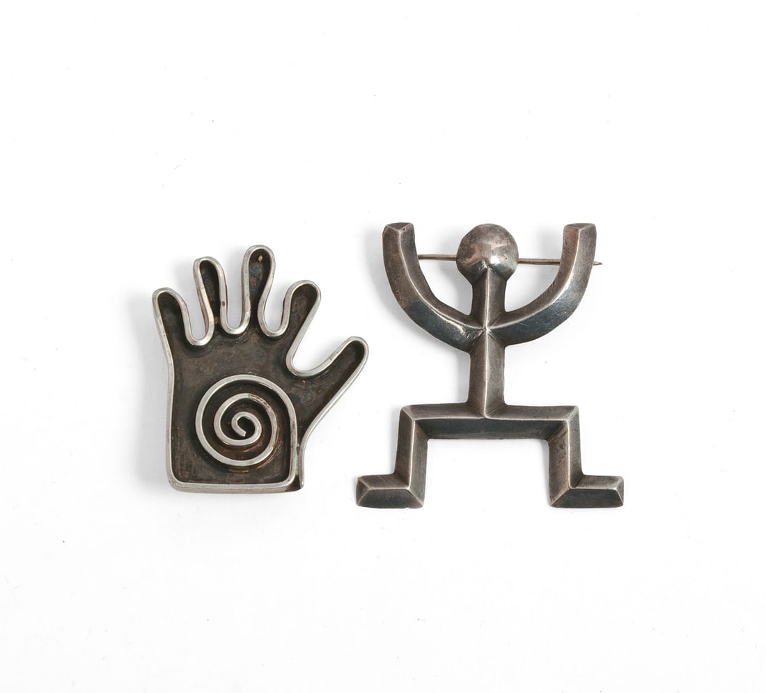 Two Native American Sterling Pins.: Hand, signed Harrison, 1.5 x 1 inches, and a stick figure.