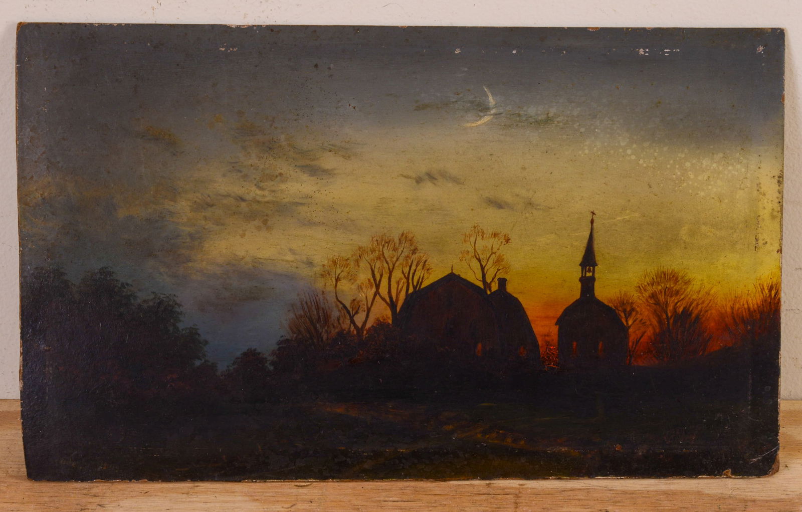19th c. Twilight Landscape Painting.: Tonalist view of a village in silhouette, illegibly signed l.l., inscribed on verso with a couple of names and dated Dec. 25, 1873, oil on artist board, 7 x 12 inches, unframed.