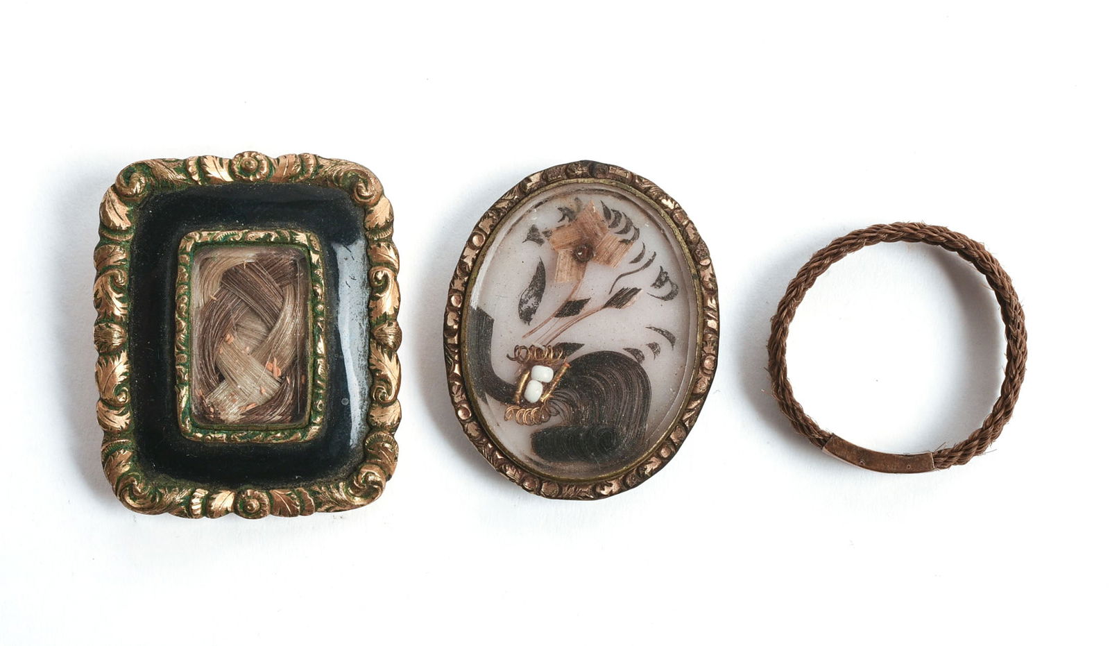 Three Pieces of Hair Jewelry: 19th century, largest 1.25 x 1 inch.