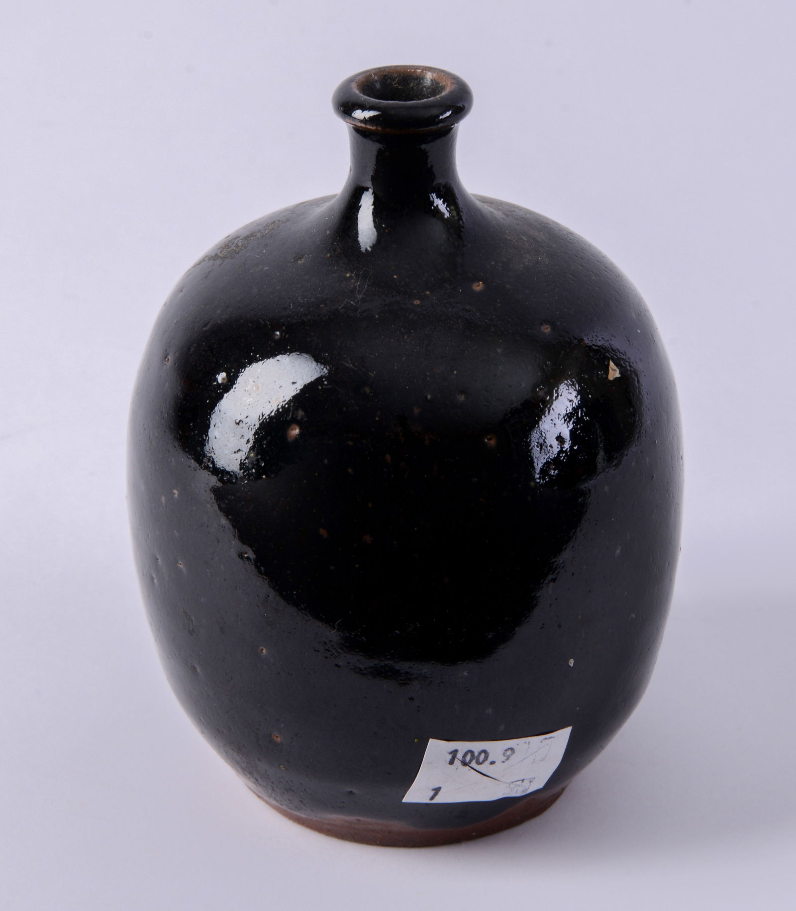 Small New England Redware Jar. - 2