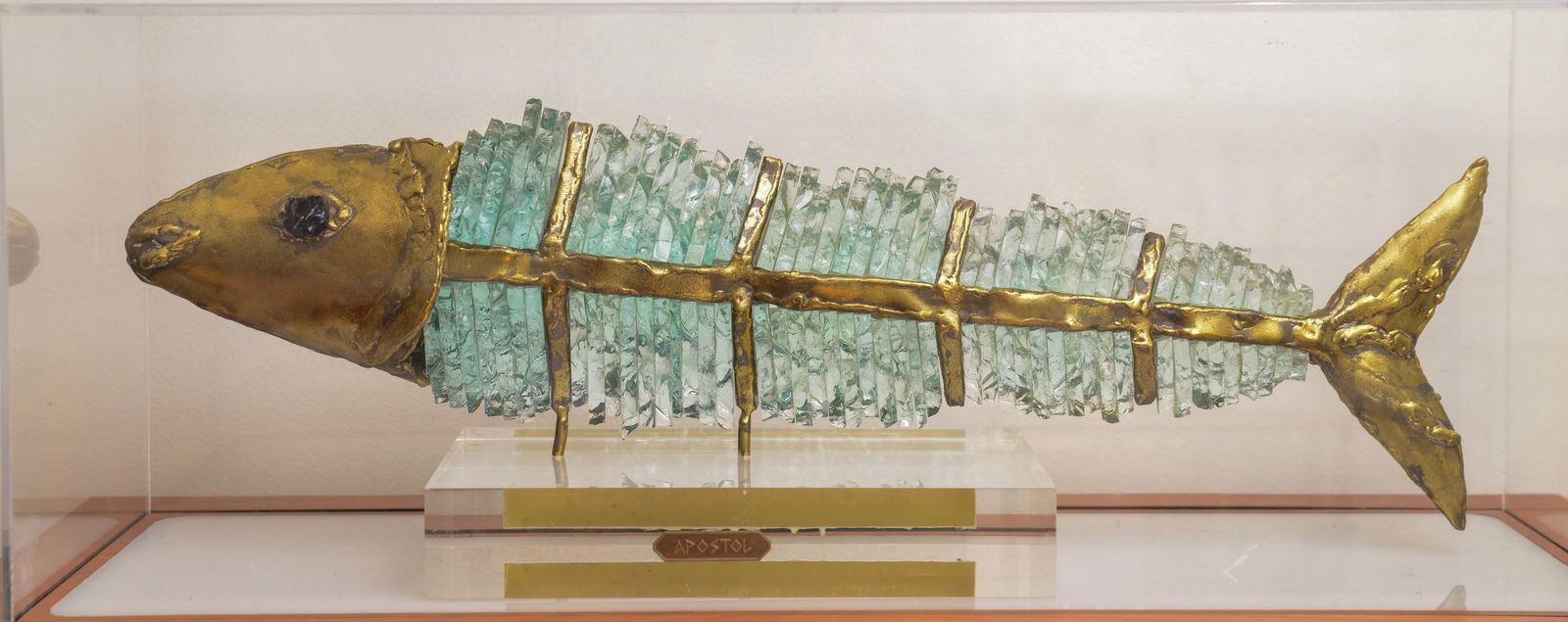 Modernist Glass and Metal Fish Sculpture.: Length 24 inches, labeled 'Apostol.' On a custom light up display stand, height 52 inches, width 31 inches, depth 13 inches.