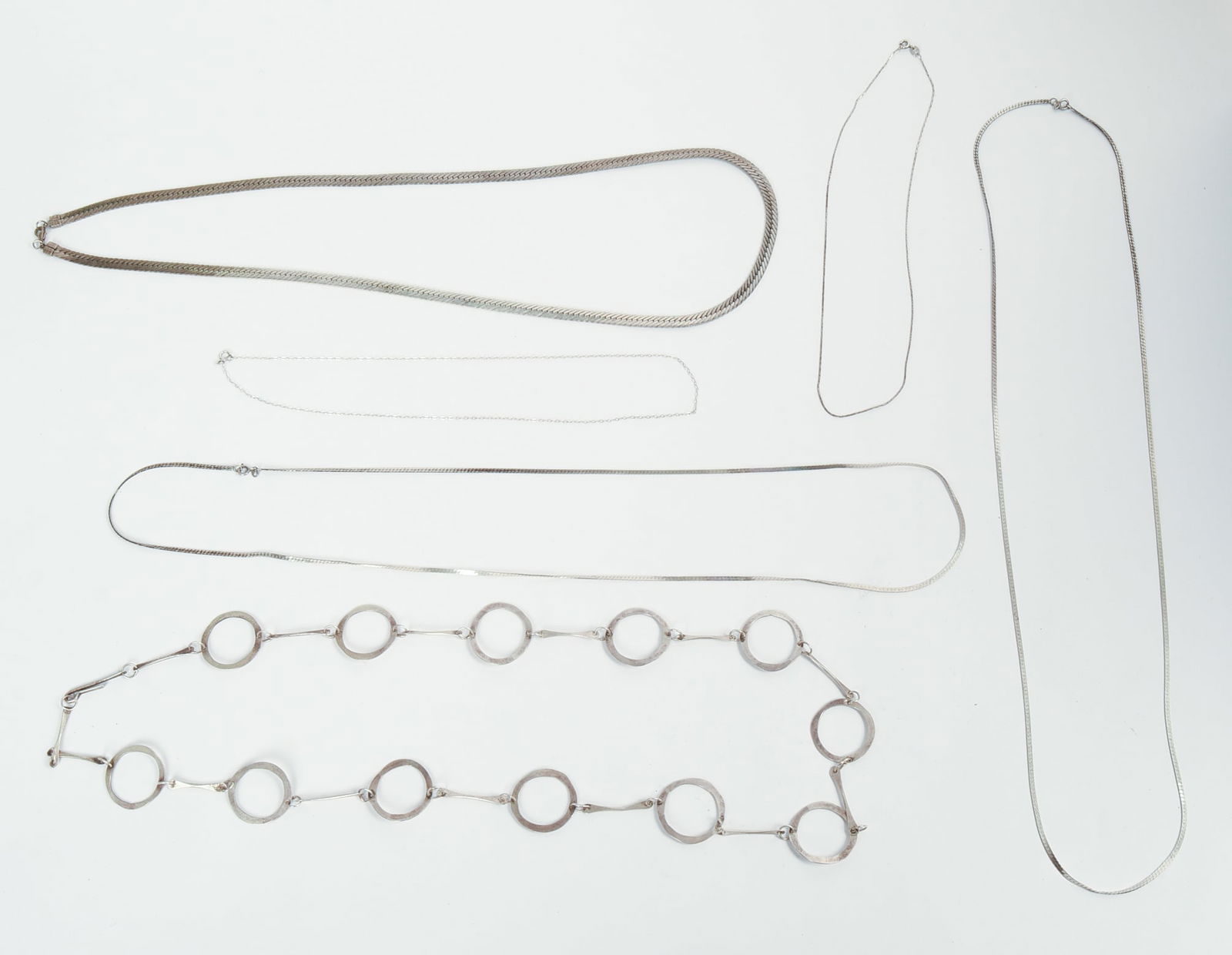 Group of Silver Necklaces.: Two marked sterling, length of longest 30 inches.