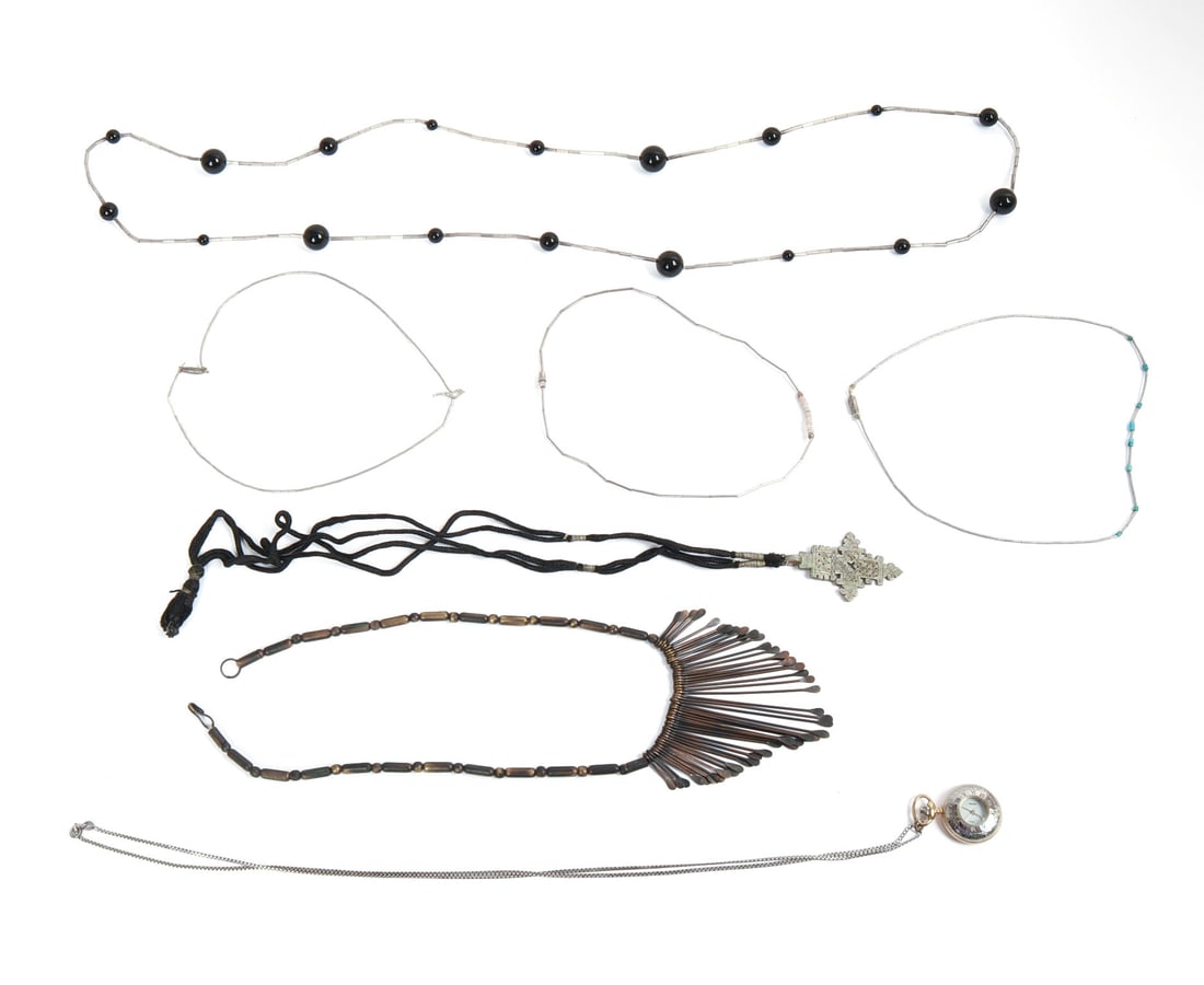 Seven Vintage Necklaces.: One metal beads, length 18 inches, three thin sterling necklaces, sterling and black beads, and a pendant necklace with rope chain.