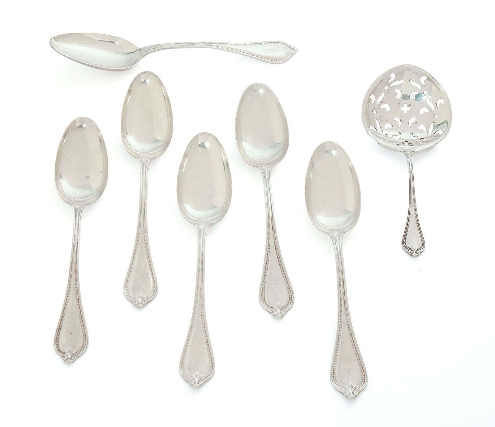 Six Gorham Sterling Silver Teaspoons and A Tea Strainer.: 129 grams.