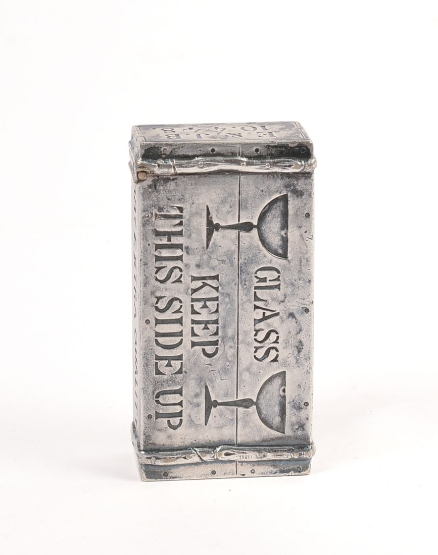 TIFFANY & CO. BOLLINGER CHAMPAGNE CRATE MATCH SAFE: Silver soldered, circa 1900, 2.375 x .75 x 1.25 inches. Some rust to interior.