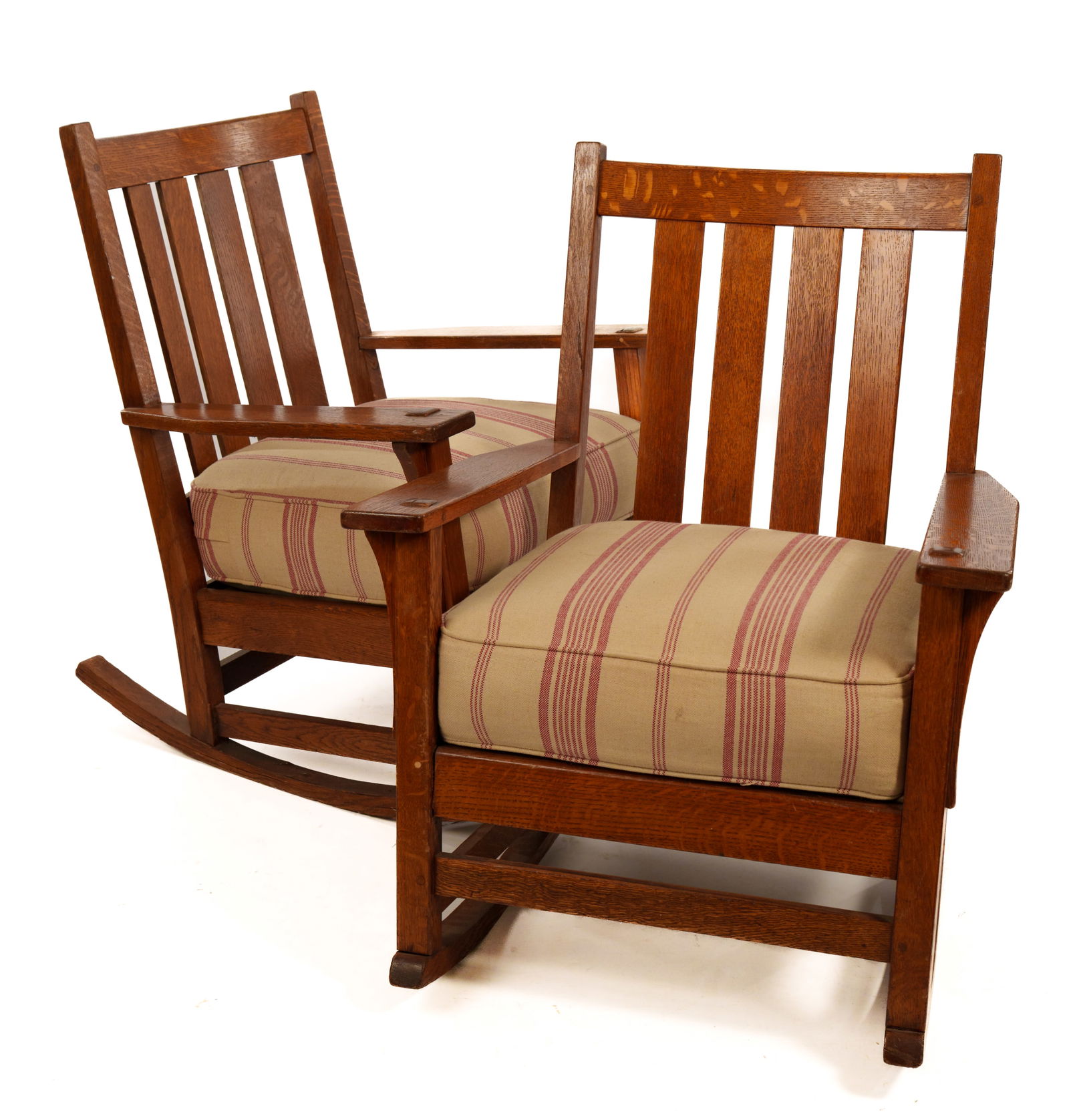 L. & J.G. STICKLEY PAIR OF ROCKERS.: Seat height 18 inches, overall height 34 inches, width 22 inches. One with partial label.