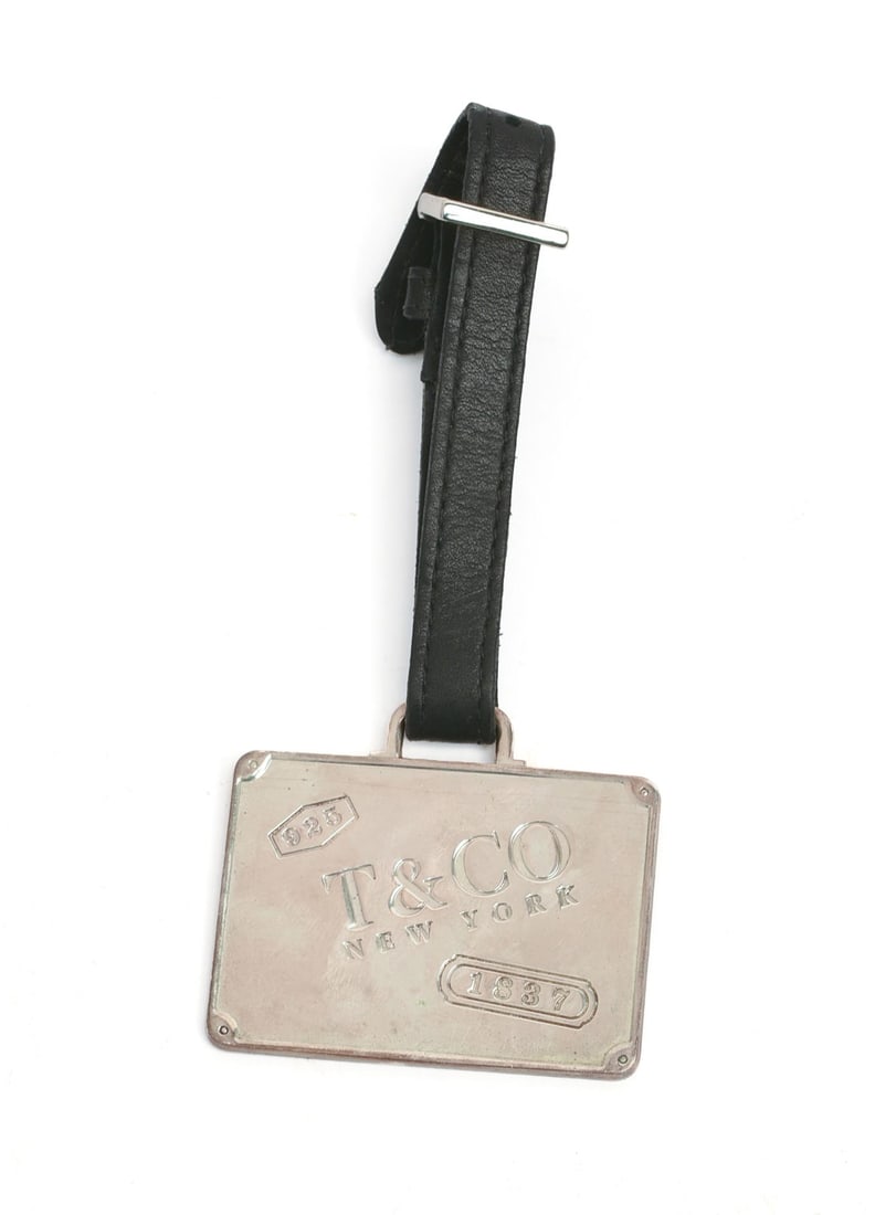 Tiffany & Co. Sterling Silver Luggage Tag.: From the collection of Jane Morgan. 1.5 x 2.25 inches, 42 grams. 
