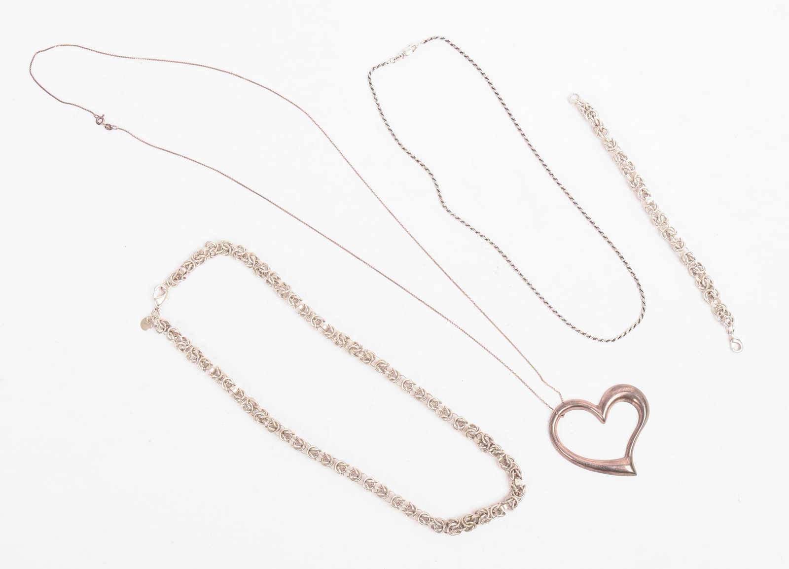 Three Sterling Silver Necklaces and a Bracelet. (1 of 4)