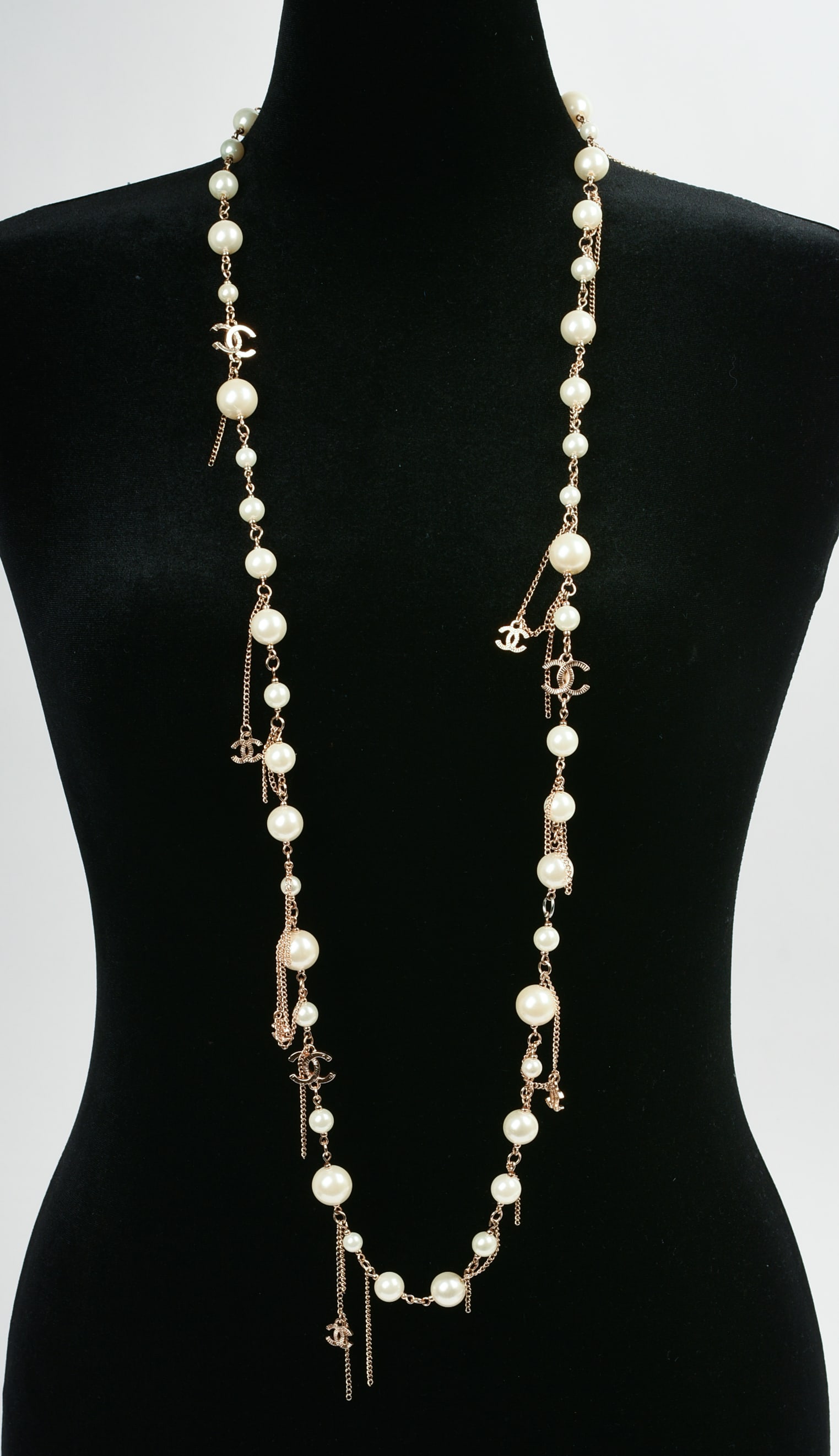 Chanel Pearl Necklace.: Faux pearls with Chanel box. Length 48 inches, good condition. 