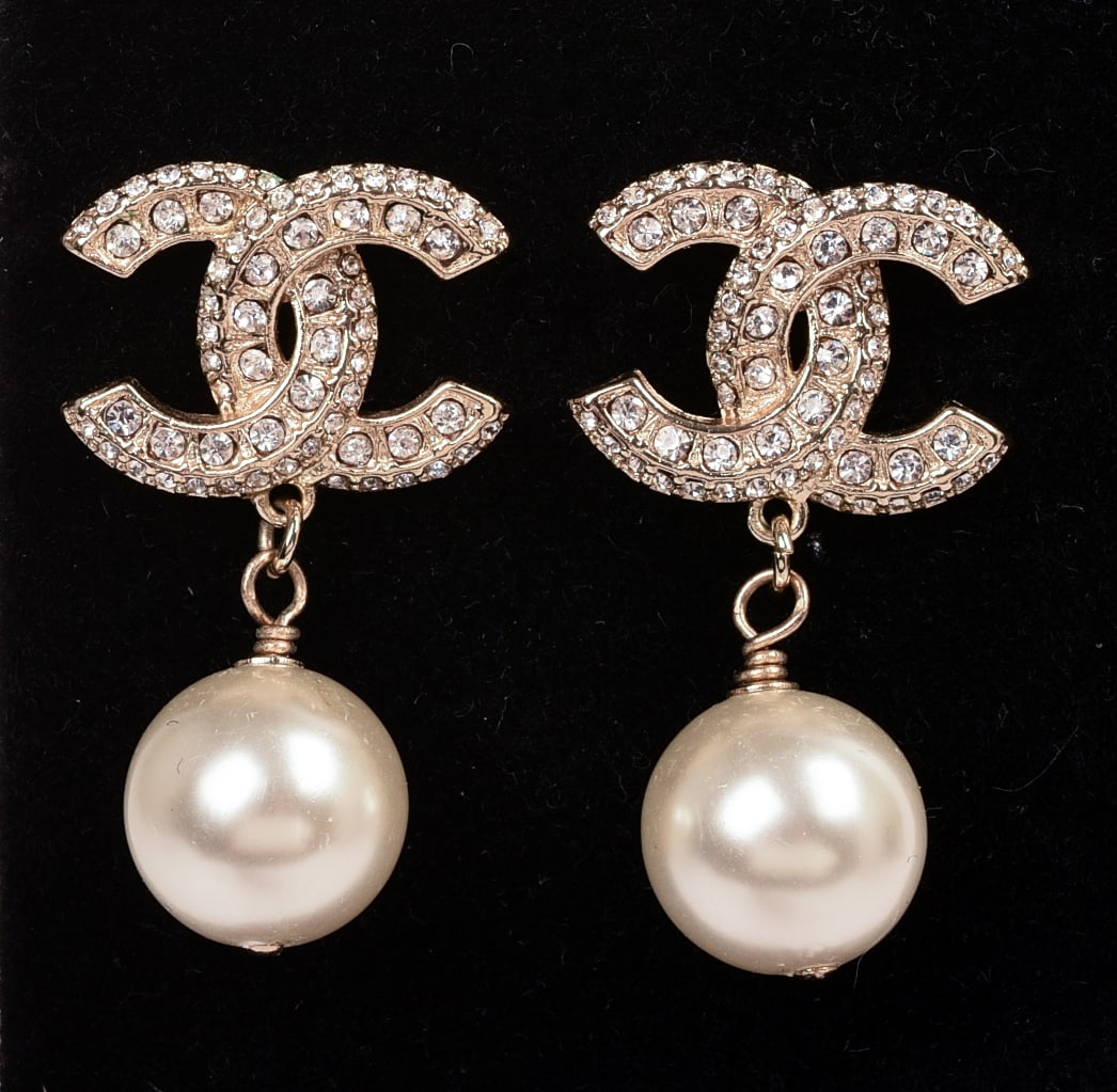Chanel Pearl Earrings.: Length 1 inch, for pierced ears.