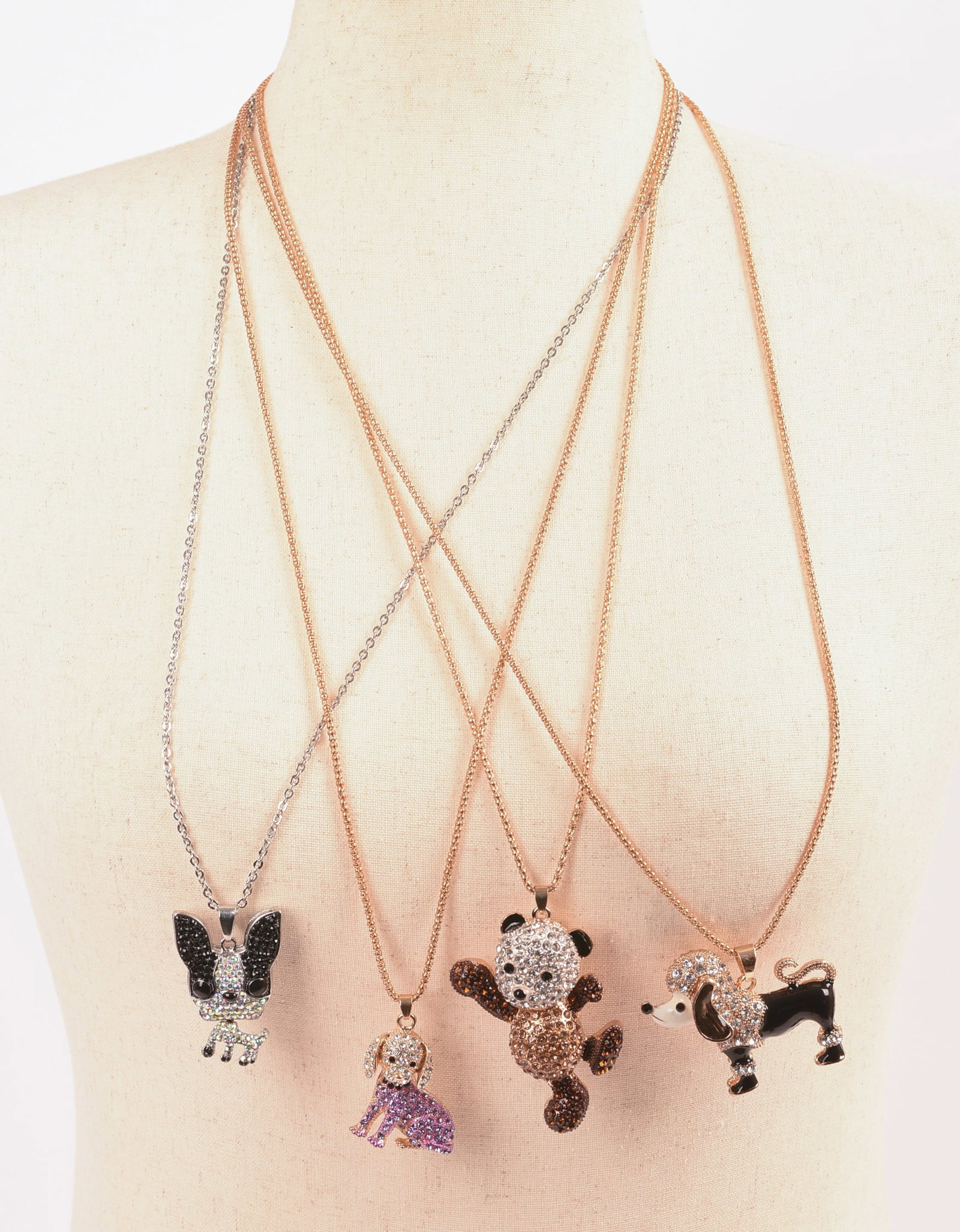 Four Betsey Johnson Necklaces.: Three dogs and a bear, extra long chains.