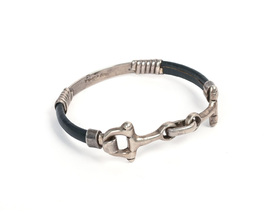 Sterling Silver and Leather Bracelet.: Diameter 2.25 inches.