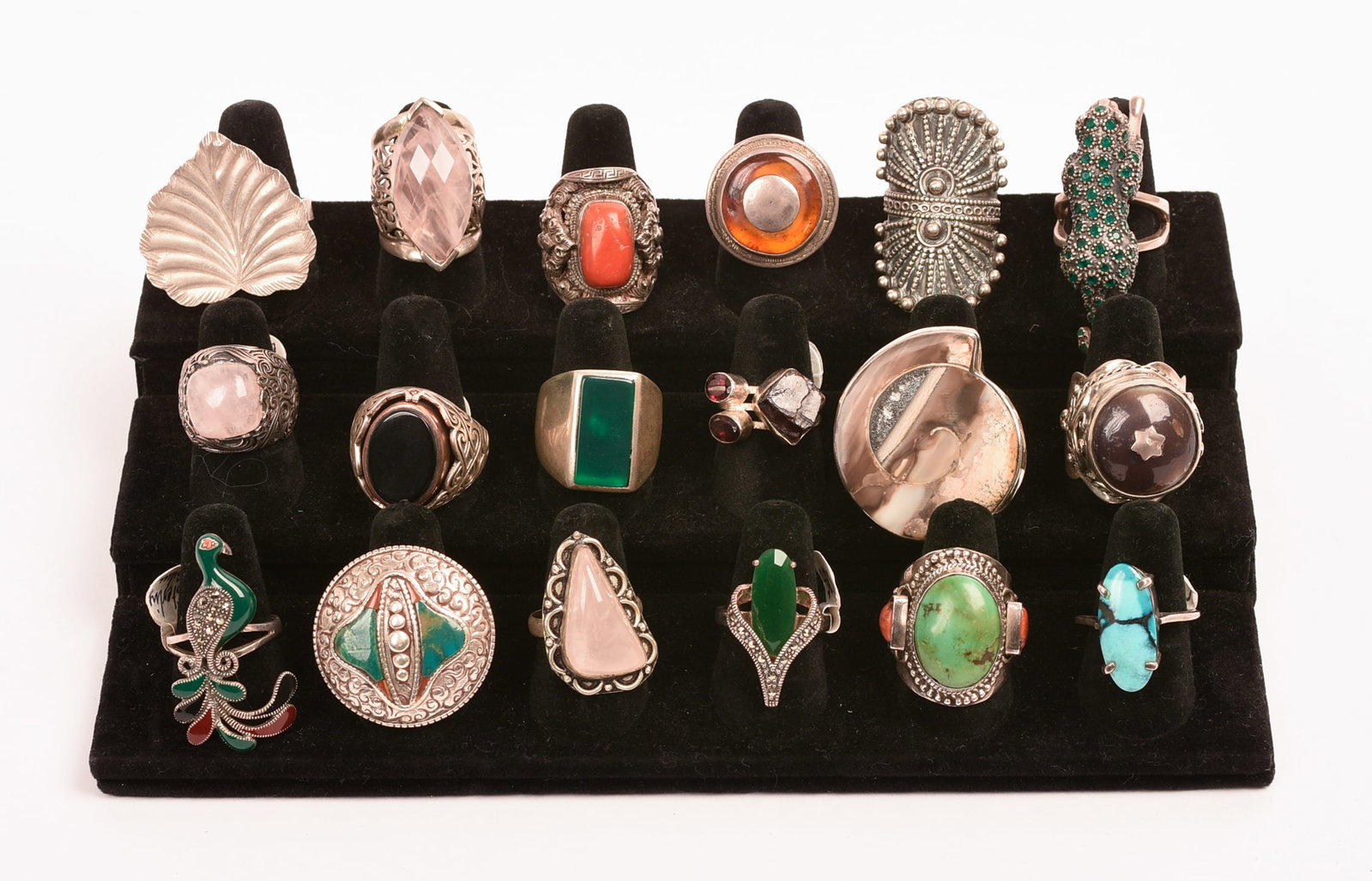 18 Large Costume Jewelry Rings.: Assorted stones, some sterling. Includes display board.