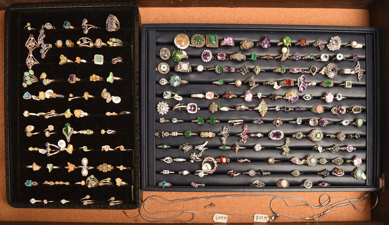 Large Collection of Costume Jewelry Rings in a Display Case.: 175+ rings, case 24 x 14 x 3.5 inches. Case included.