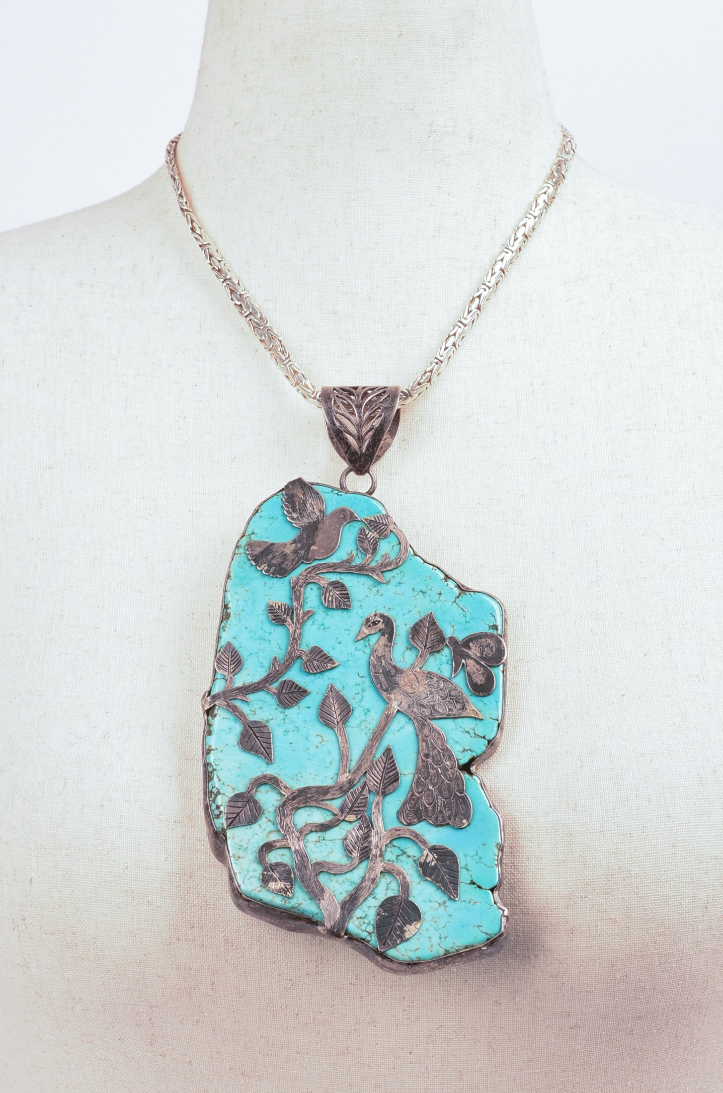 Antique Turquoise Pendant with Birds.: 6 x 3.5 inches. With sterling silver chain.