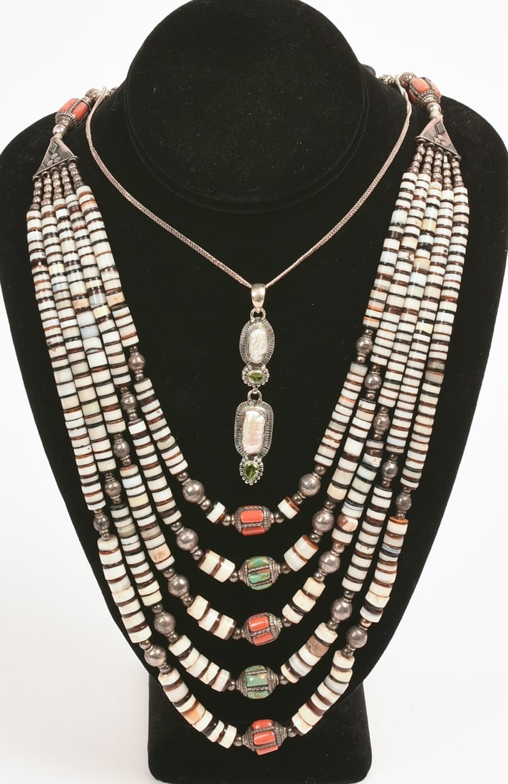 Two Necklaces.: One mother of pearl and sterling, length 16 inches; the other beaded. Includes display form.