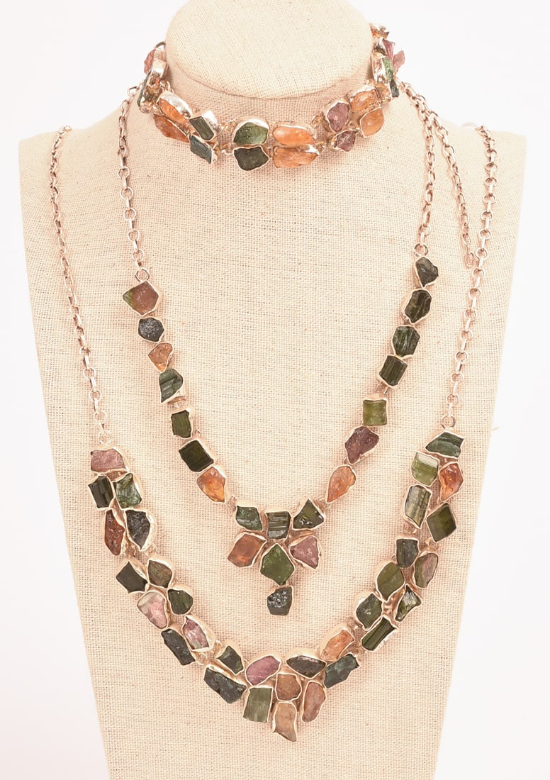 Two Tourmaline Necklaces and a Bracelet.: Necklaces 18 inches, diameter of bracelet 2.5 inches. Stand included.