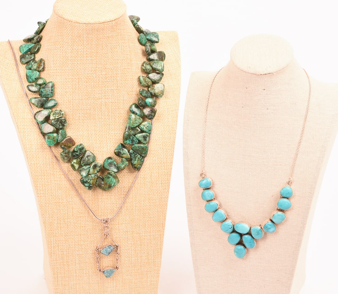 Three Turquoise Necklaces.: Length of longest 28 inches. One stand included.