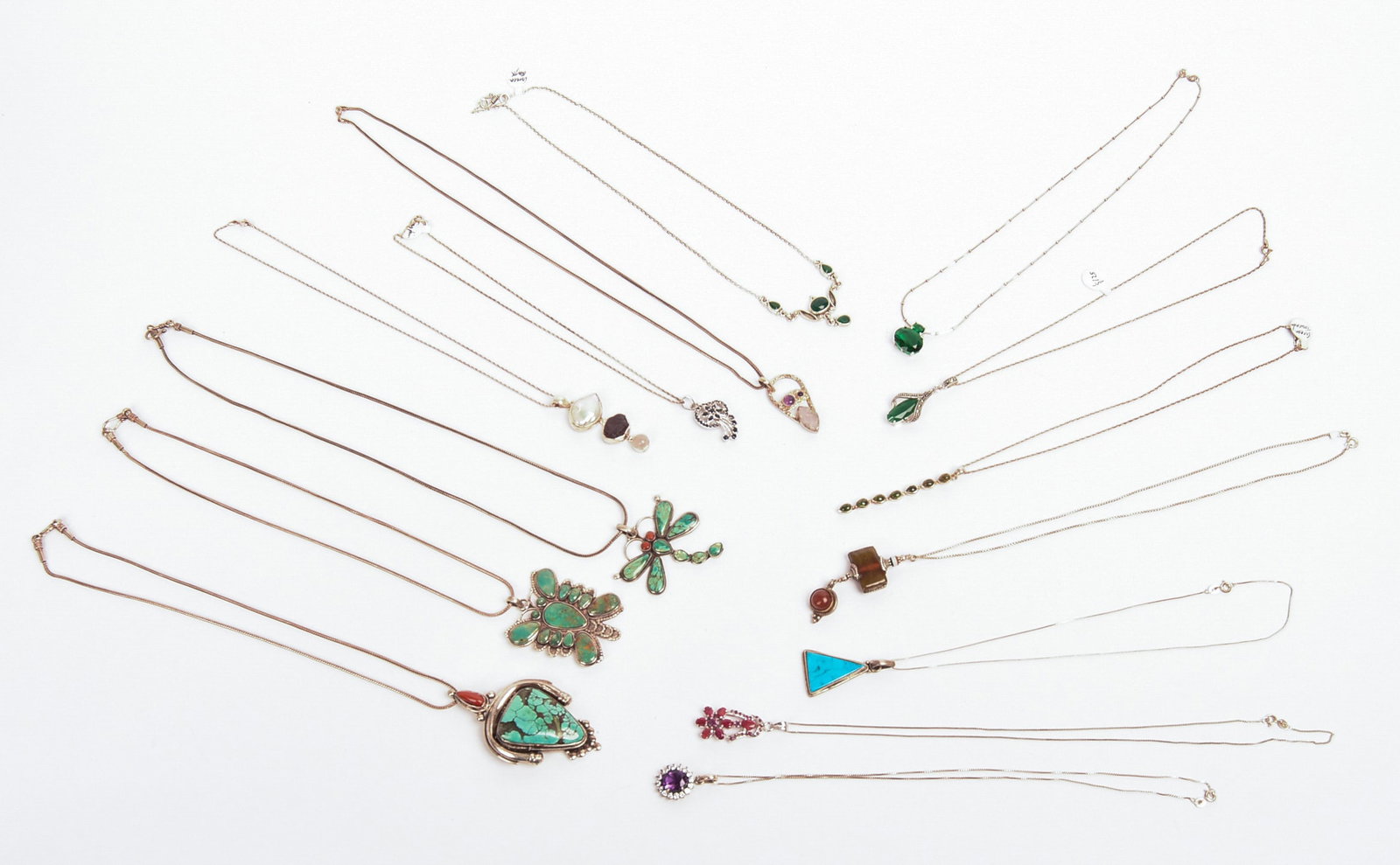 Fifteen Pendant Necklaces.: Turquoise, Amethyst, and other stones. Chains 14 to 22 inches.