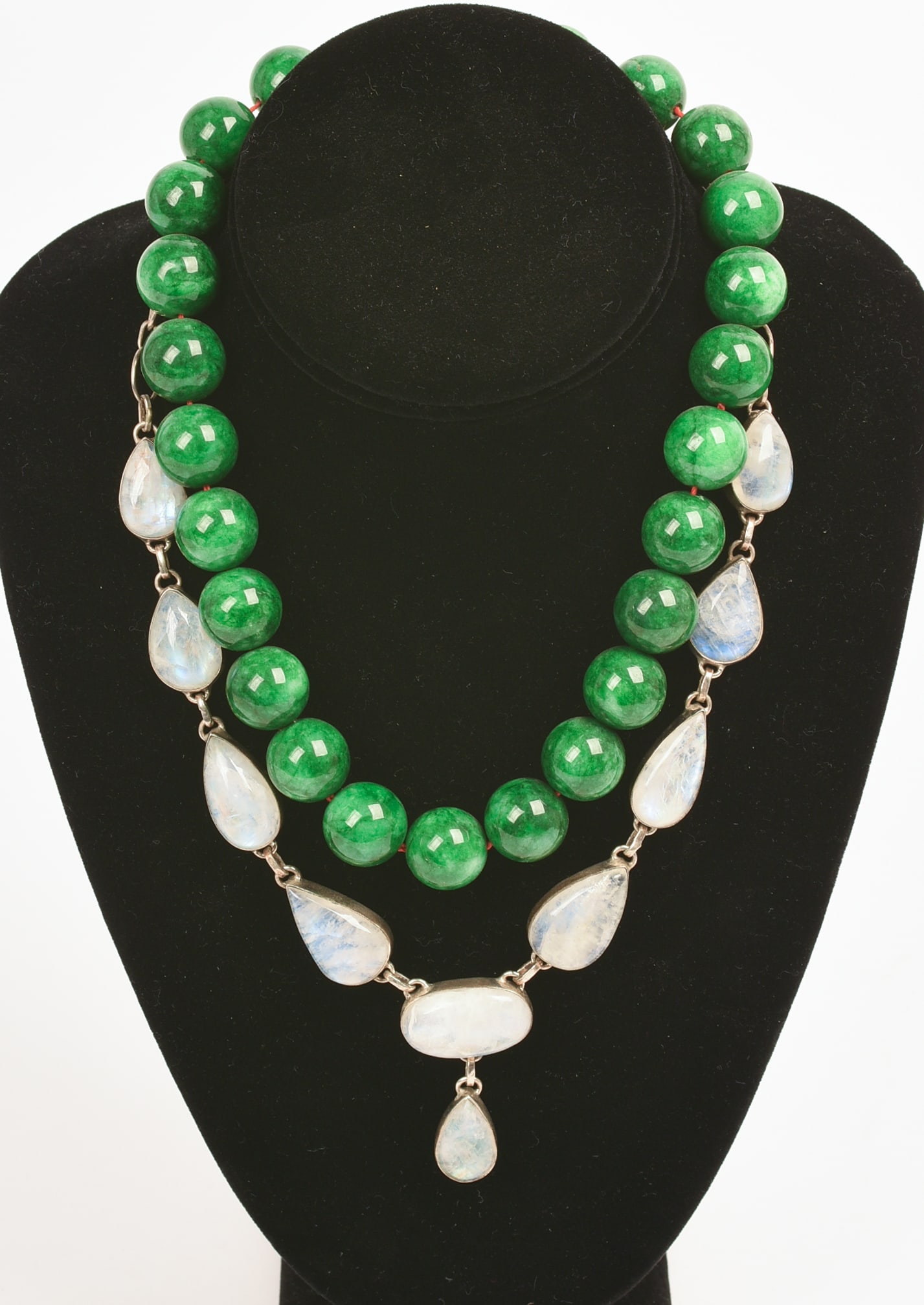 Two Necklaces: Jade and Moonstone.: Lengths 14 inches. Stand included.