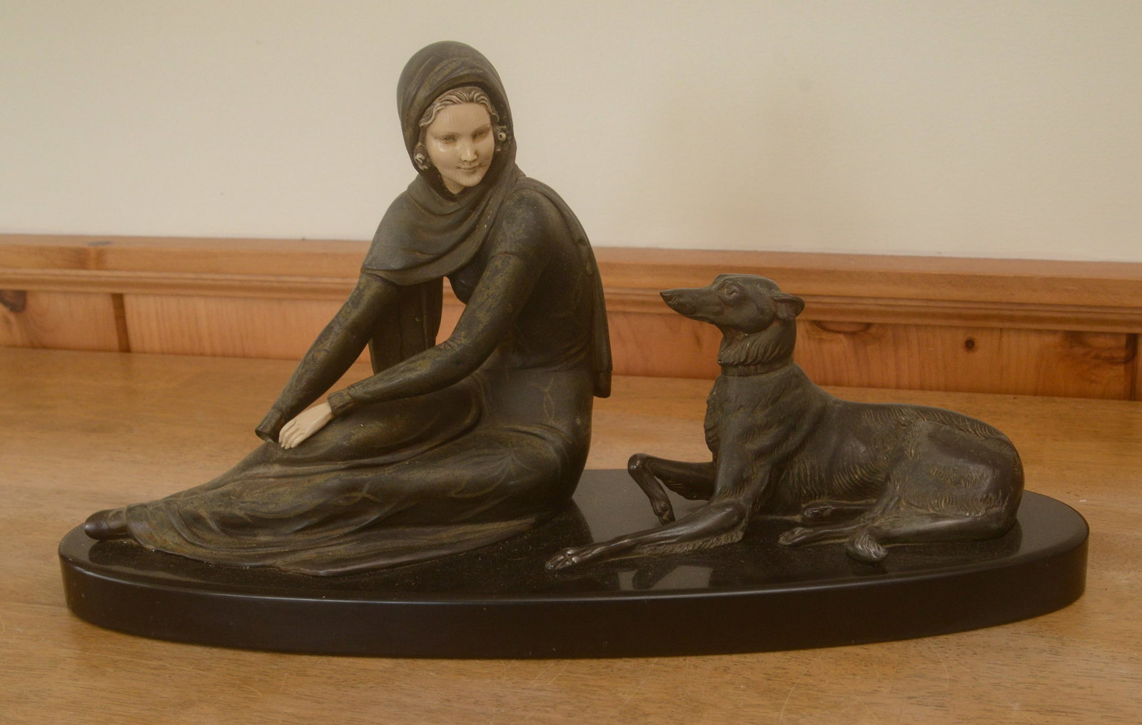 Bronze Sculpture of a Woman and Dog.: Height 11 inches, length 20 inches. Missing one hand.