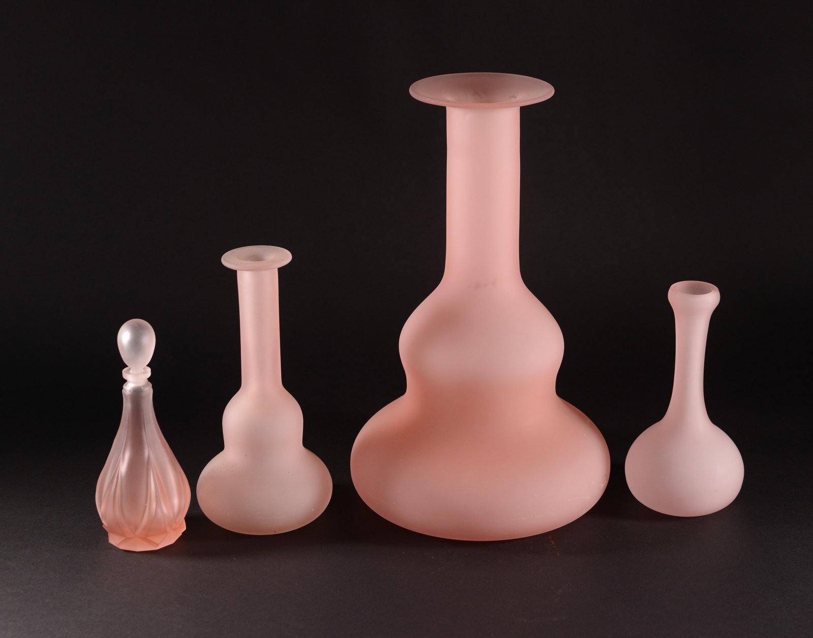 Four Pink Frosted Glass Pieces.: Height of tallest 14.5 inches. Good condition.