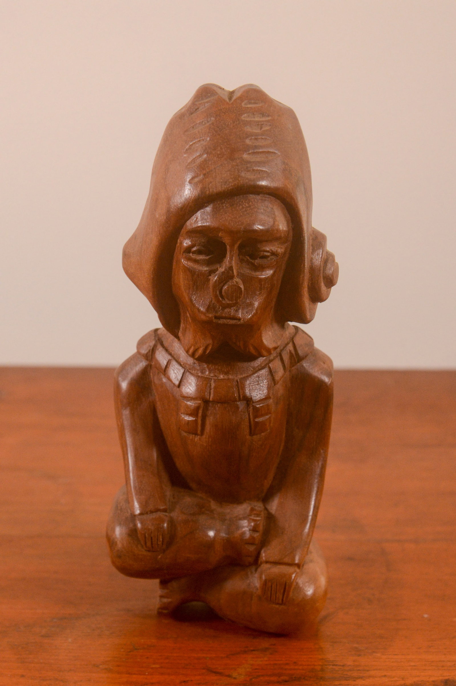 Ecuadorian Carved Figure.: Height 7.5 inches.