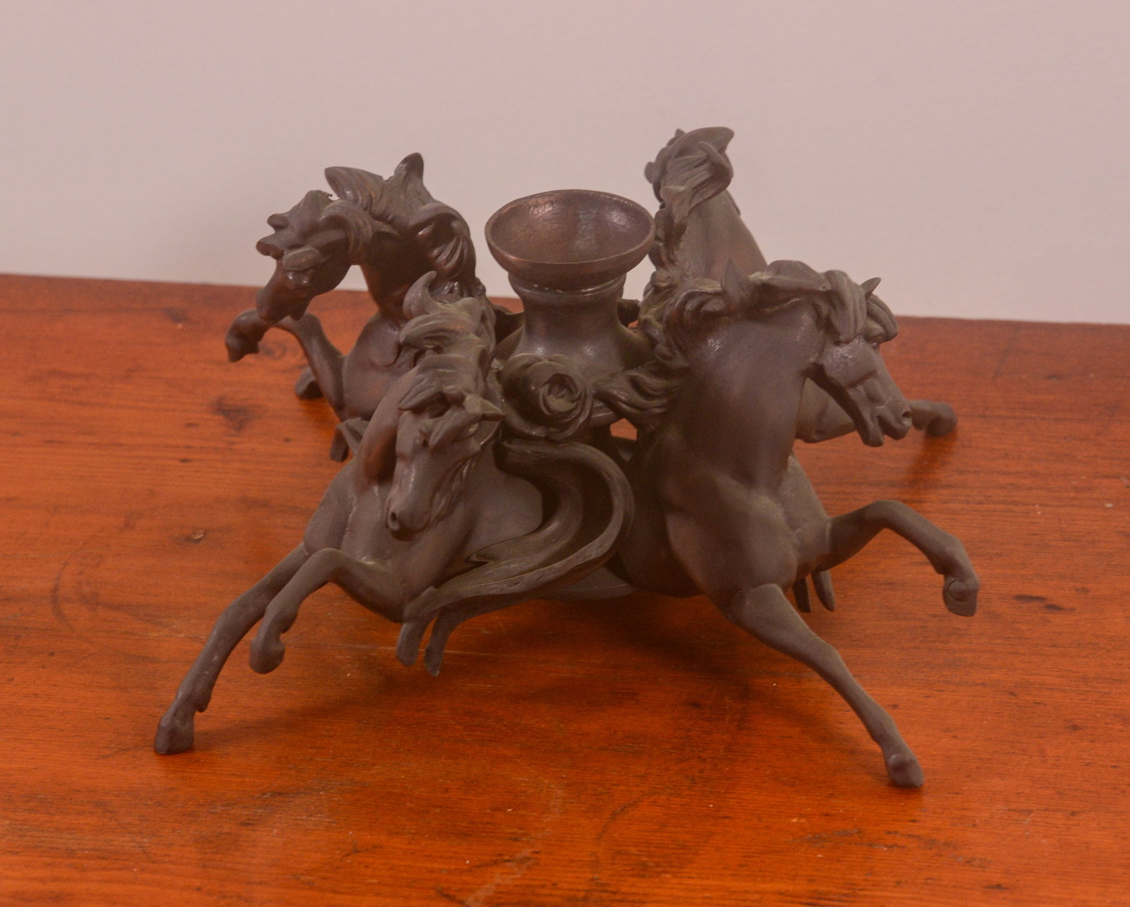 Bell Metal Candlestick With Horses.: Height 5 inches, diameter 9 inches.