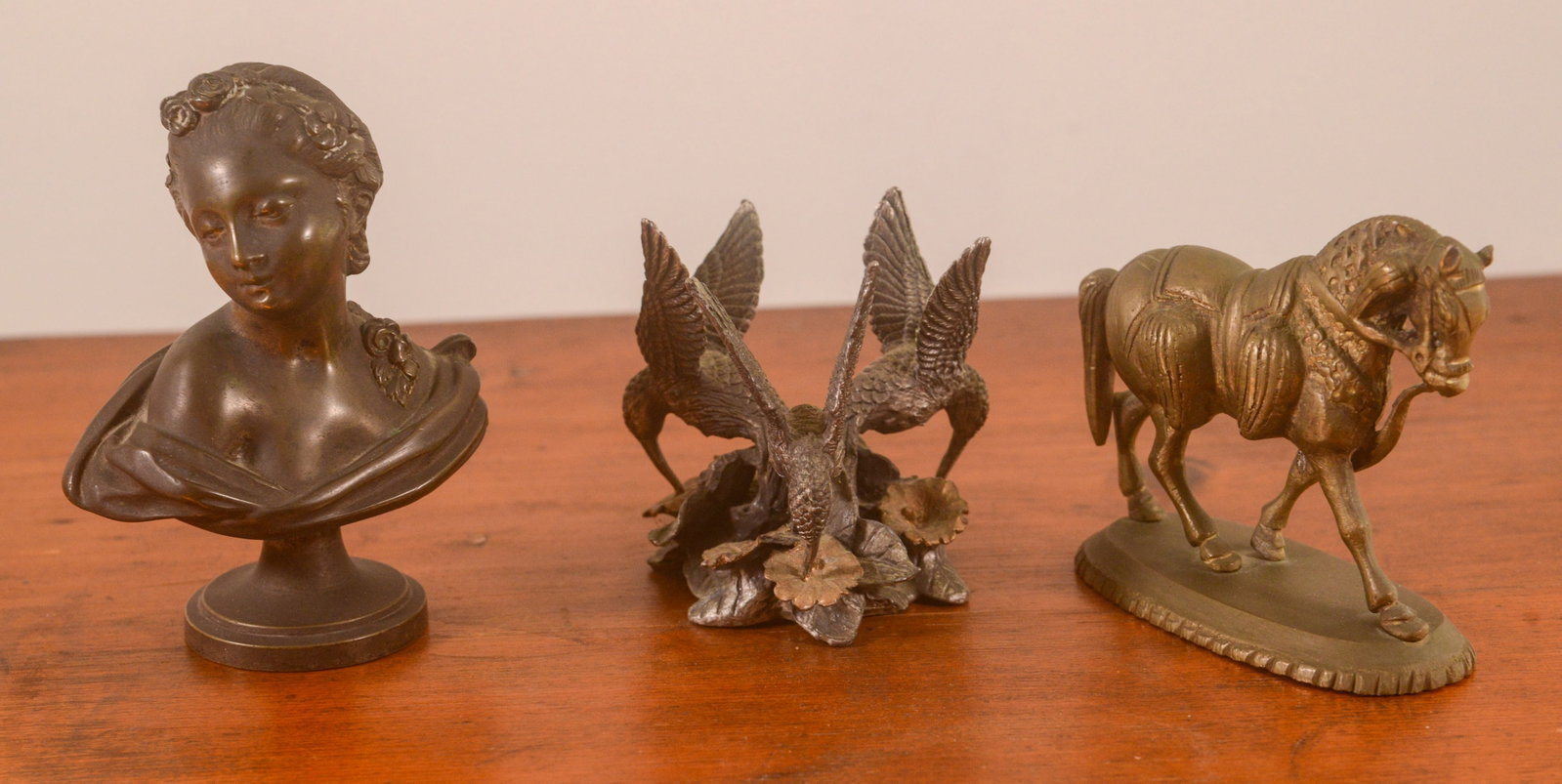 Three Small Metal Figures.: Bust, height 4 inches, a horse, and birds.