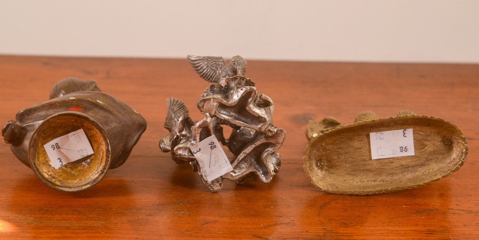 Three Small Metal Figures. - 2