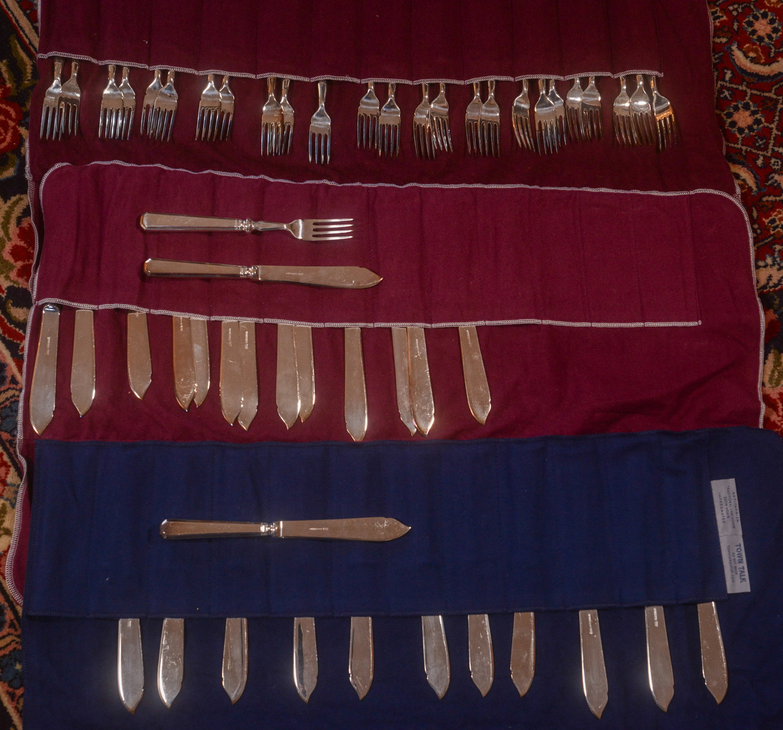 Garrard & Co Flatware.: 26 knives and 26 forks.