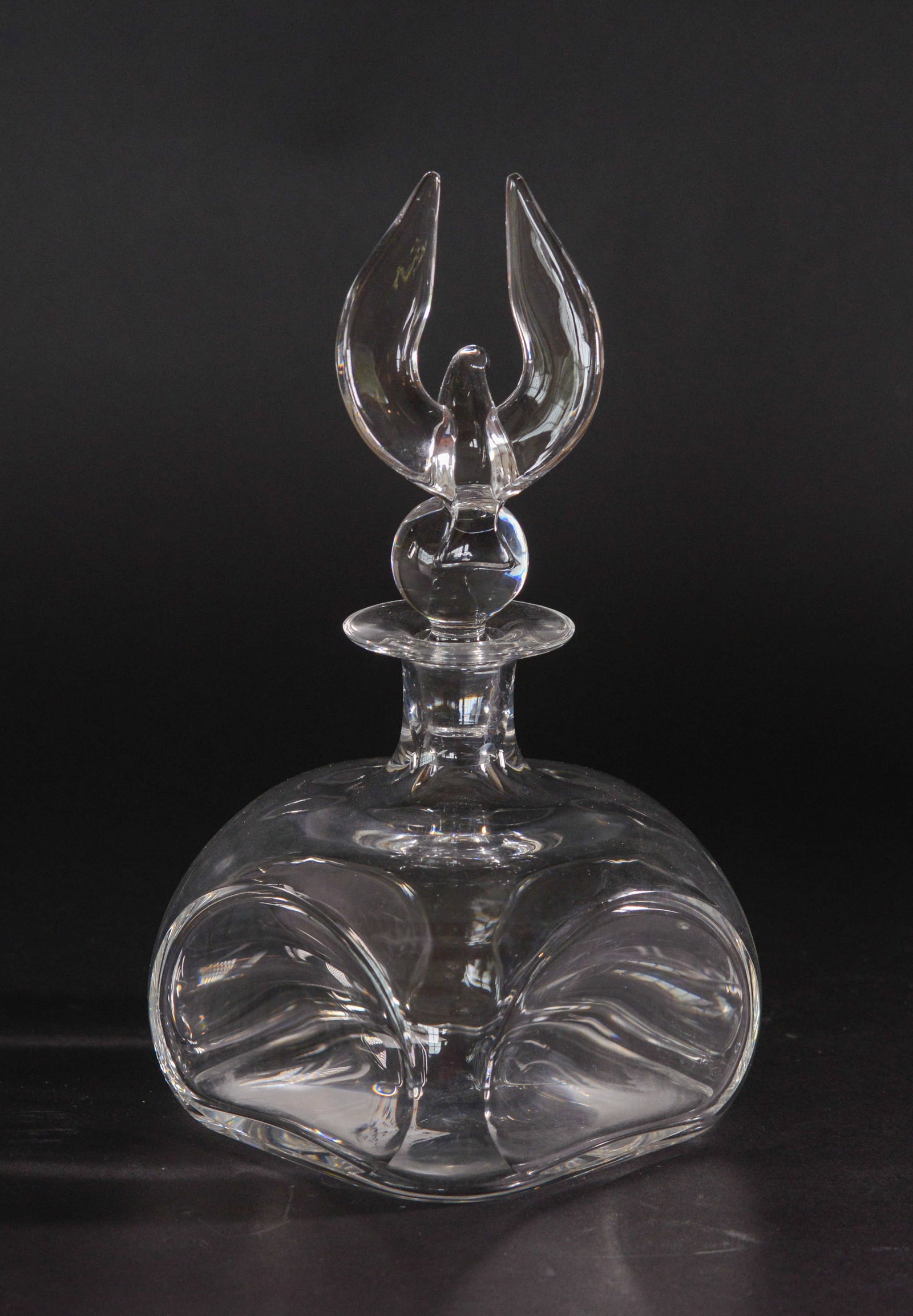 Blown Glass Decanter With Eagle Stopper.: Height 11 inches, good condition.
