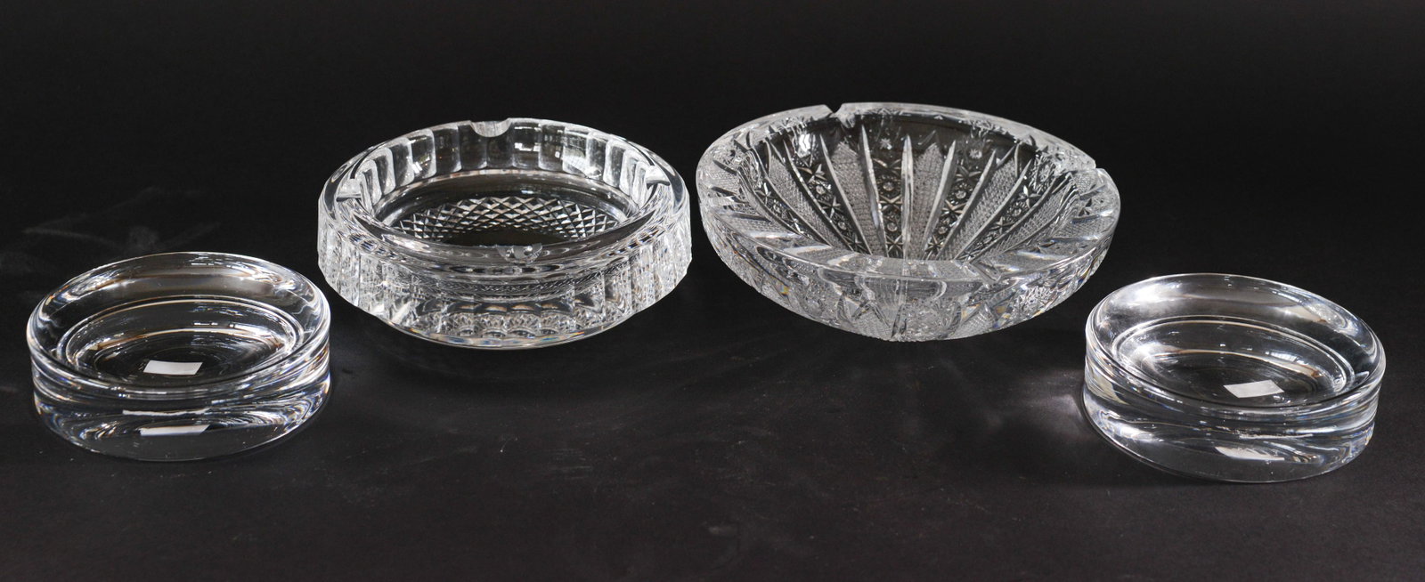 Four Crystal Ashtrays. - 4