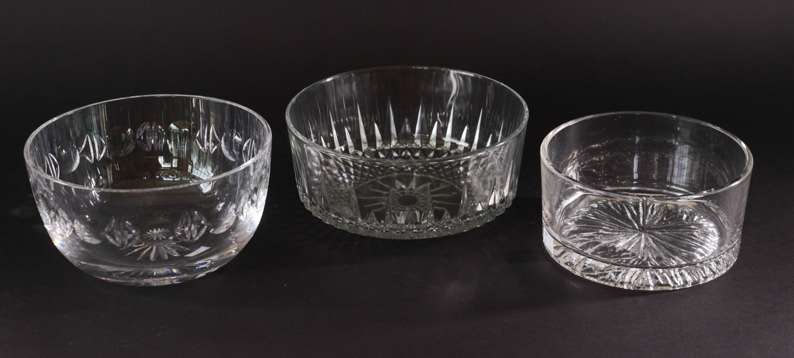 Three Cut Glass Bowls.: Diameters 7.5 to 9 inches..