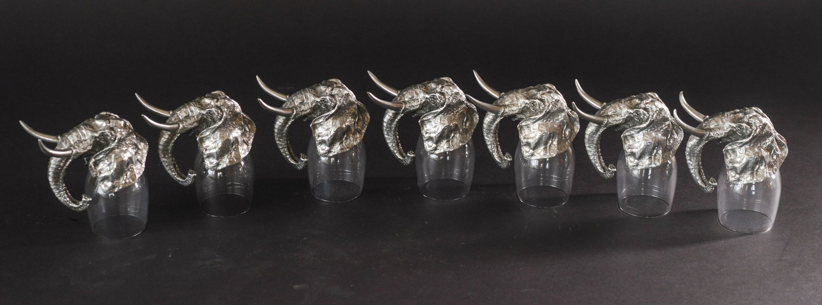 Seven Frankli Wild Elephant Stirrup Cups.: Height 4 inches.