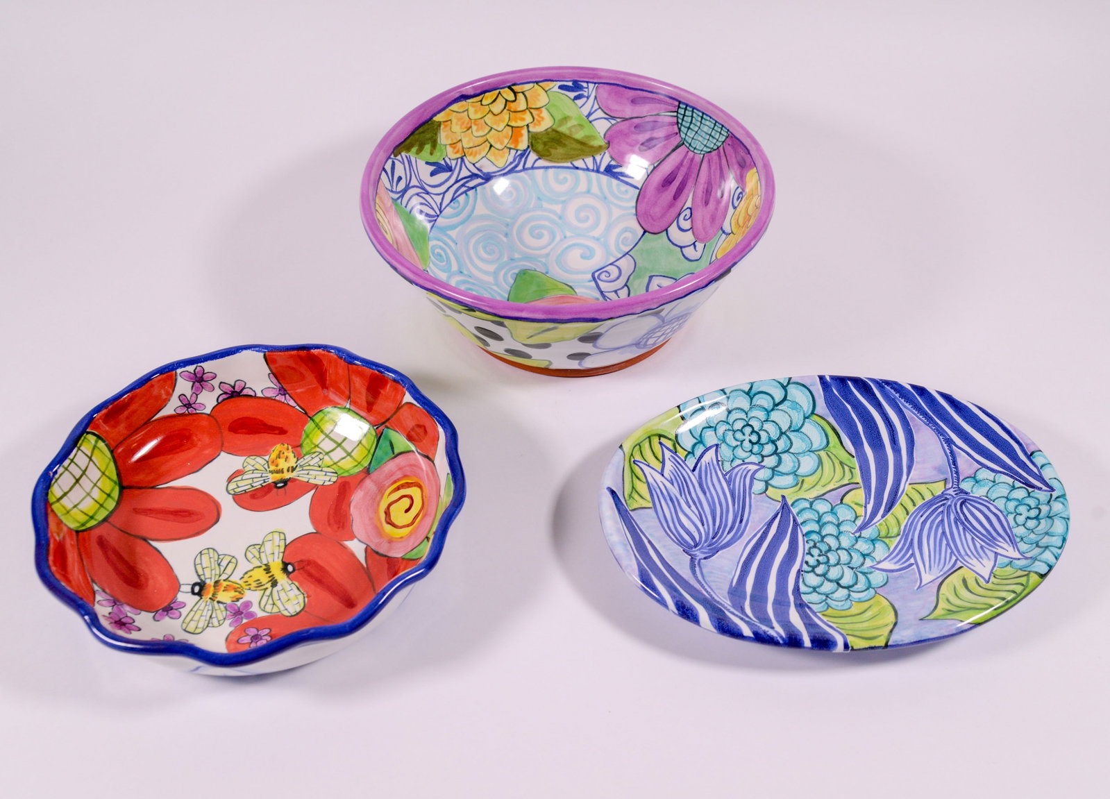 Two Damariscotta Pottery Dishes and a Bowl.: Diameter of bowl 10.5 inches.