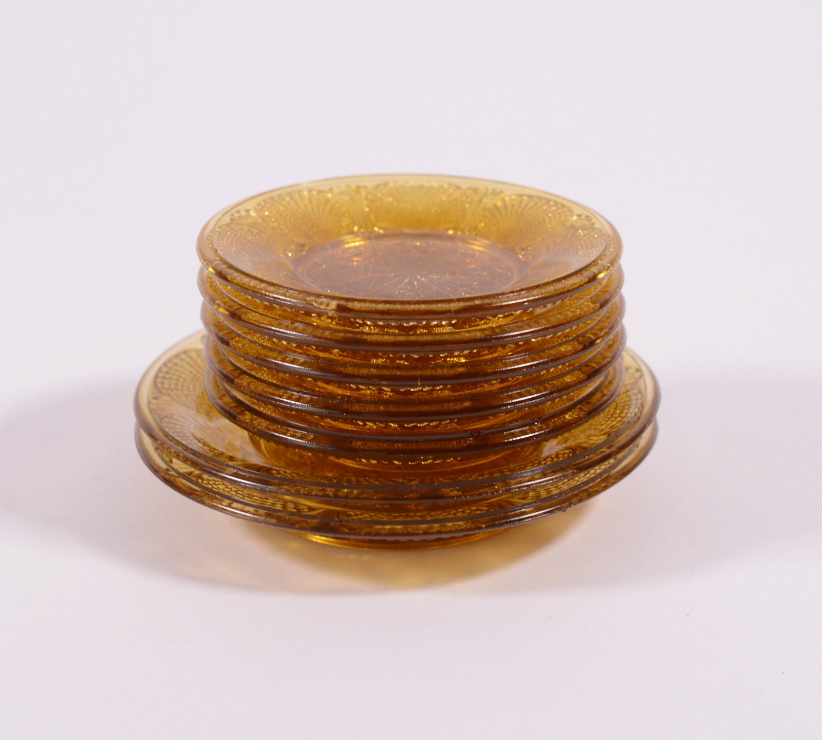 Seven Glass Cup Plates.: Diameters 3.75 and 4.75 inches.