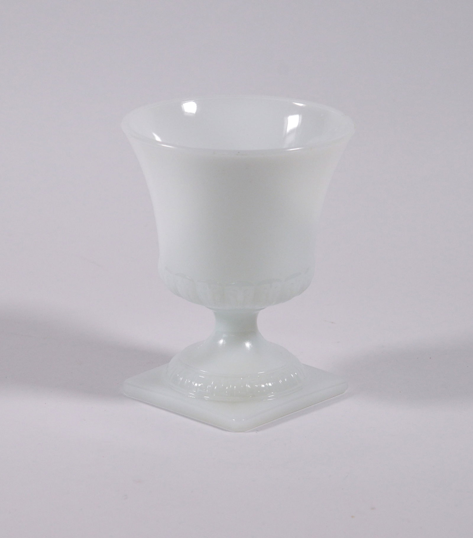 Small E.O. Brody Co. Milk Glass Urn.: Height 7 inches.