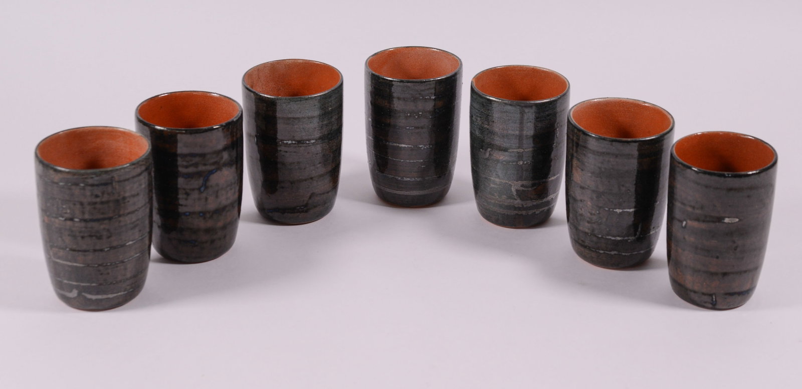 Six Studio Pottery Mugs.: Height 4.75 inches.