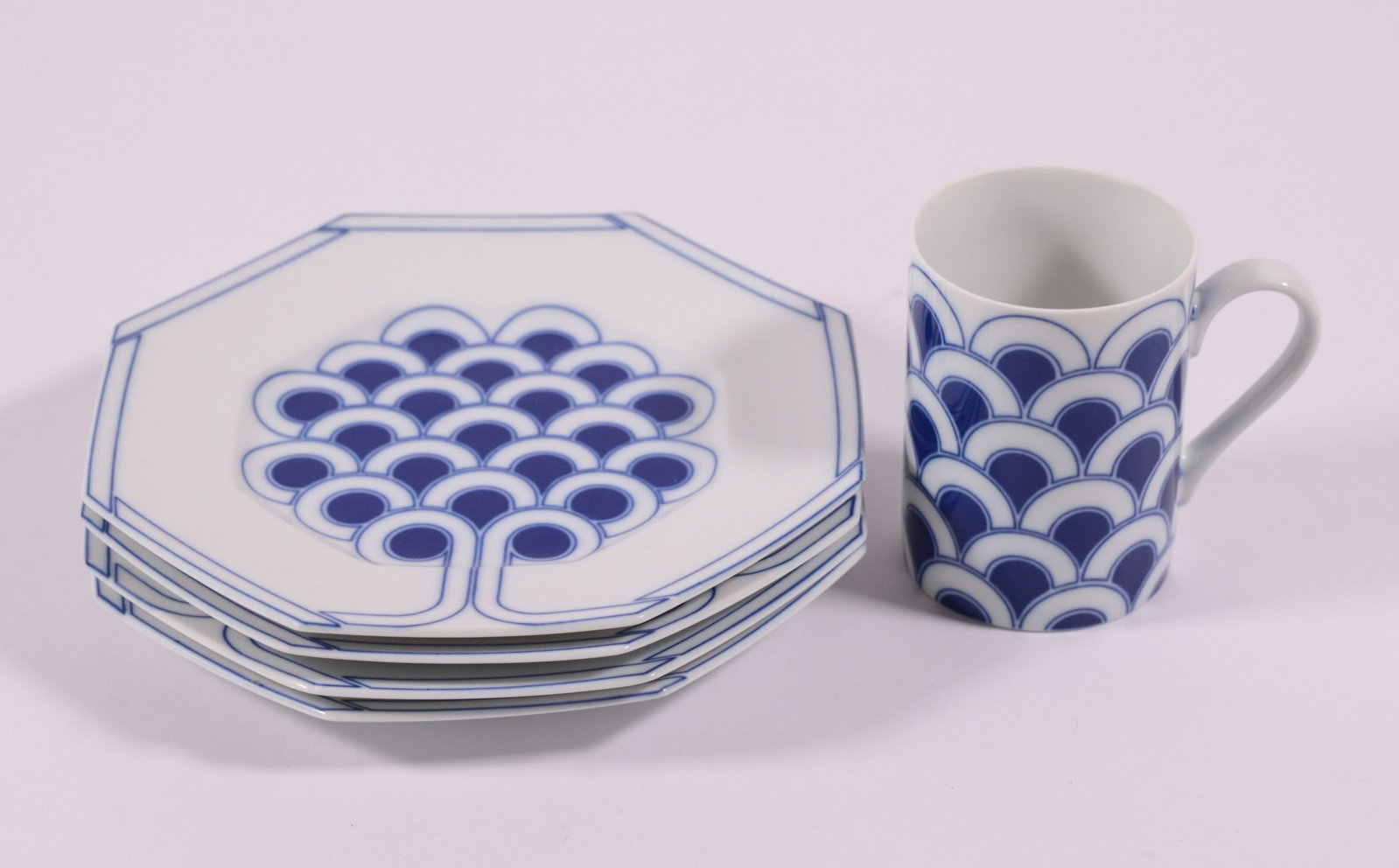 Four Fitz & Floyd Topiary Plates and a Mug. (1 of 3)