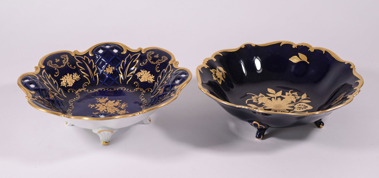 Two German Porcelain Blue and Gold Footed Bowls.: Diameter 10 inches.