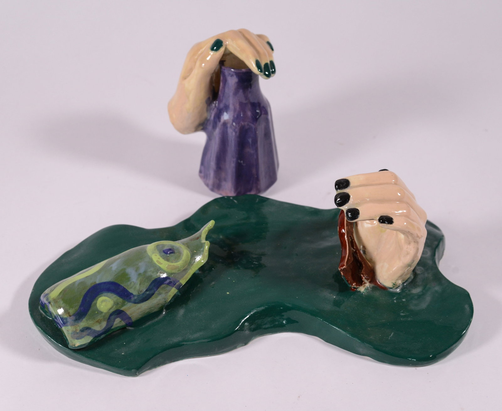 Two Studio Pottery Hand Sculptures.: Length of larger 13 inches.