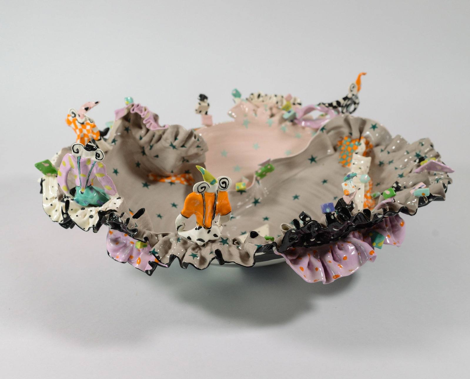 Whimsical Studio Pottery Bowl With Figures.: Diameter 18 inches.